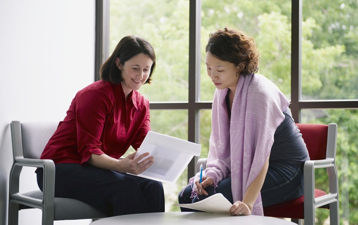 woman in meeting with her supervisor