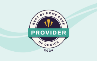 A badge with a circular design labeled "Best of Home Care Provider of Choice 2024." The words "Provider" are highlighted in a green ribbon across the center. The badge is set against a light blue background with abstract wavy lines.