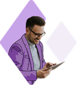 Illustration of a man wearing glasses and a purple suit, smiling while looking at and using a tablet, with a light purple diamond-shaped background.